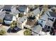 Aerial photo displays home in a community with well-maintained houses and green lawns at 1676 Paradise Lake Dr, Mount Pleasant, SC 29464