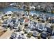 Panoramic aerial shot of a neighborhood near a lake, featuring neat landscaping at 1676 Paradise Lake Dr, Mount Pleasant, SC 29464