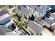 Birds eye view of the yellow home in a neighborhood with a fenced in backyard at 1676 Paradise Lake Dr, Mount Pleasant, SC 29464