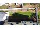 Aerial shot of a lush green backyard with privacy fence and shade trees at 1676 Paradise Lake Dr, Mount Pleasant, SC 29464