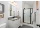 Modern bathroom featuring granite vanity, sleek glass shower, and contemporary fixtures at 1676 Paradise Lake Dr, Mount Pleasant, SC 29464