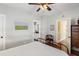 Bright bedroom featuring a white ceiling, wood floors, and ensuite bathroom at 1676 Paradise Lake Dr, Mount Pleasant, SC 29464