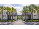 Inviting community pool with palm trees and cabana; perfect for relaxation and recreation at 1676 Paradise Lake Dr, Mount Pleasant, SC 29464