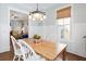 Cozy dining room with wood floors and wainscoting at 1676 Paradise Lake Dr, Mount Pleasant, SC 29464