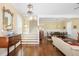 Elegant entryway featuring hardwood floors, a staircase, and an open floor plan at 1676 Paradise Lake Dr, Mount Pleasant, SC 29464