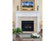 Close-up of a fireplace with a decorative mantel and tiled surround at 1676 Paradise Lake Dr, Mount Pleasant, SC 29464