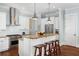 A detailed view of the kitchen island with granite countertops, and stainless steel appliances at 1676 Paradise Lake Dr, Mount Pleasant, SC 29464