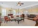 Open-concept living room with hardwood floors, recessed lighting, and a dining area at 1676 Paradise Lake Dr, Mount Pleasant, SC 29464
