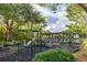 Well-maintained community playground featuring various play structures and equipment for recreation at 1676 Paradise Lake Dr, Mount Pleasant, SC 29464