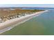 Breathtaking aerial view of the coastal community with houses along the shoreline, offering ocean and marsh views at 1699 E Ashley Ave # B, Folly Beach, SC 29439