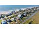 Beachfront homes with ocean and marsh views, surrounded by lush greenery at 1699 E Ashley Ave # B, Folly Beach, SC 29439