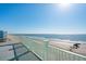 Stunning balcony view overlooking a beautiful sandy beach and ocean at 1699 E Ashley Ave # B, Folly Beach, SC 29439