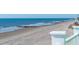 Expansive beach view featuring soft sand and gentle waves, a short walk from the property at 1699 E Ashley Ave # B, Folly Beach, SC 29439