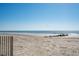 Expansive sandy beach with calm waves, perfect for relaxing and enjoying the coastal scenery at 1699 E Ashley Ave # B, Folly Beach, SC 29439