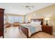 Spacious bedroom with hardwood floors, sitting area, and ocean views at 1699 E Ashley Ave # B, Folly Beach, SC 29439