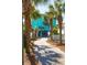 Charming beach house surrounded by lush palm trees, featuring a private driveway and inviting coastal architecture at 1699 E Ashley Ave # B, Folly Beach, SC 29439