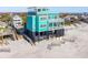 Multi-story oceanfront home with private balconies and beach access at 1699 E Ashley Ave # B, Folly Beach, SC 29439