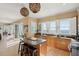 Open kitchen with granite counters, an island with seating, and stunning views of the ocean at 1699 E Ashley Ave # B, Folly Beach, SC 29439