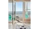 Stunning ocean view from a balcony, showcasing turquoise chairs and clear blue waters at 1699 E Ashley Ave # B, Folly Beach, SC 29439