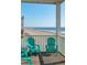 Outdoor porch offers beautiful beach views and features comfortable Adirondack seating at 1699 E Ashley Ave # B, Folly Beach, SC 29439