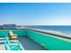 Relaxing rooftop deck with seating offering panoramic views of the ocean and beach at 1699 E Ashley Ave # B, Folly Beach, SC 29439