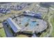 An aerial view of the community pool, clubhouse, and surrounding neighborhood at 201 Symphony Ave, Summerville, SC 29486
