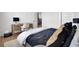 Cozy bedroom featuring a bed with decorative pillows and a nearby workspace with a desk at 201 Symphony Ave, Summerville, SC 29486