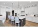 Modern kitchen featuring white cabinets, a center island, and stainless steel appliances at 201 Symphony Ave, Summerville, SC 29486