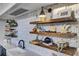 A kitchenette with decorative shelving, decor, and a sink basin at 201 Symphony Ave, Summerville, SC 29486