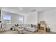 Spacious living room with a large couch, bright windows, and a dedicated ' play area at 201 Symphony Ave, Summerville, SC 29486