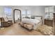 Elegant main bedroom featuring a fur rug, an arched mirror, and lots of natural light at 201 Symphony Ave, Summerville, SC 29486