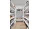 Spacious pantry with organized shelving providing ample storage for food and kitchen essentials at 201 Symphony Ave, Summerville, SC 29486