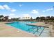 Large community pool with crystal clear water and ample lounge seating available at 201 Symphony Ave, Summerville, SC 29486