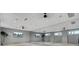 Bright studio with neutral tones, a full mirrored wall, and mounted television at 201 Symphony Ave, Summerville, SC 29486