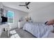 Bedroom with neutral walls and carpet, white bedroom set, and ceiling fan at 2029 Country Manor Dr, Mount Pleasant, SC 29466