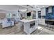 Open-concept layout seamlessly blends the kitchen with the living room, ideal for entertaining Gathering and friends at 2029 Country Manor Dr, Mount Pleasant, SC 29466