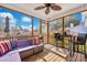 Screened in porch with outdoor seating featuring a ceiling fan and backyard view at 2029 Country Manor Dr, Mount Pleasant, SC 29466