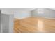 Bright bonus room featuring hardwood floors, with a window letting in natural light at 209 Brailsford Rd, Summerville, SC 29485