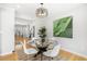Cozy dining room featuring a glass-top table, seating for four, and contemporary decor at 209 Brailsford Rd, Summerville, SC 29485