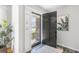 Inviting entryway showcasing a decorative door, slate flooring, and a peek into the front yard at 209 Brailsford Rd, Summerville, SC 29485