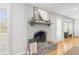 Cozy fireplace featuring gray painted brick and decorative mantel at 209 Brailsford Rd, Summerville, SC 29485