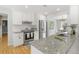 Updated kitchen with granite counters, stainless appliances and eat-in dining area at 209 Brailsford Rd, Summerville, SC 29485