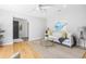 Open-concept living room with hardwood floors, a decorative rug, and stylish furnishings at 209 Brailsford Rd, Summerville, SC 29485