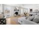 Living room showcasing brick fireplace and sight lines to kitchen at 209 Brailsford Rd, Summerville, SC 29485