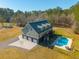 Spacious three-car garage complements this charming home, complete with a fenced pool area for outdoor enjoyment at 214 Shelby Shea Ln, Moncks Corner, SC 29461