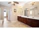 Bright bathroom with a double vanity, tile flooring, decorative lighting, and a clear glass shower at 214 Shelby Shea Ln, Moncks Corner, SC 29461