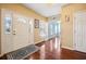 Bright foyer with hardwood floors, offering a glimpse into the home's open and inviting layout at 214 Shelby Shea Ln, Moncks Corner, SC 29461
