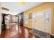 Elegant foyer with gleaming hardwood floors, setting a sophisticated tone for the home's interior at 214 Shelby Shea Ln, Moncks Corner, SC 29461