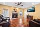 Inviting living room featuring a fireplace and hardwood floors, creating a cozy atmosphere at 214 Shelby Shea Ln, Moncks Corner, SC 29461