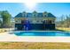Backyard view with an in-ground swimming pool and patio, perfect for outdoor enjoyment at 214 Shelby Shea Ln, Moncks Corner, SC 29461